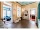 Breakfast area with built-in hutch and view into sunroom and kitchen at 2204 Monticello St, Covington, GA 30014