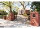 Grand brick home with gated entry and manicured landscaping at 2204 Monticello St, Covington, GA 30014