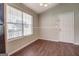 Small dining area with wood flooring and white trim at 6273 Amberly Rd, Rex, GA 30273