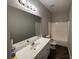 Bathroom with shower/tub combo, vanity, and vinyl flooring at 3541 Gleneagles Ct, Snellville, GA 30039