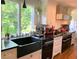 Farmhouse sink, custom cabinetry and high end appliances at 2398 Maddox Rd, Buford, GA 30519