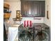 Well-appointed laundry room with washer, dryer, and ample storage at 2398 Maddox Rd, Buford, GA 30519