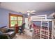 Charming bedroom with built-in bunks, a desk, and plenty of natural light at 2398 Maddox Rd, Buford, GA 30519