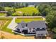Luxury home with expansive driveway and modern design at 604 N Van Wert N Rd, Villa Rica, GA 30180