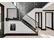 Modern black metal staircase with sleek design, adding a stylish touch to the home at 604 N Van Wert N Rd, Villa Rica, GA 30180