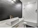 Modern bathroom with white subway tile and black shiplap at 604 N Van Wert N Rd, Villa Rica, GA 30180