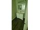 Bathroom with vanity and dark wood-look flooring at 6050 April Dr, Sugar Hill, GA 30518