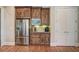 Kitchen with stainless steel refrigerator and built-in microwave at 5270 Serenity Sw Ln, Atlanta, GA 30349