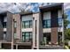 Modern townhomes with private balconies and stone accents at 426 Cedar Dust Dr # 30, Decatur, GA 30030