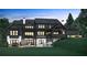 Modern farmhouse exterior, dark and light colors at 2030 Fontainbleau Dr, Conyers, GA 30094