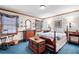 Cozy bedroom with hardwood floors and plenty of natural light at 1827 Lost Mountain Rd, Powder Springs, GA 30127