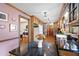Open kitchen with granite counters, lots of cabinets, and breakfast bar at 1827 Lost Mountain Rd, Powder Springs, GA 30127