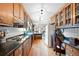 View of the kitchen, showcasing the spacious layout and granite counters at 1827 Lost Mountain Rd, Powder Springs, GA 30127