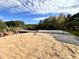 New home foundation with concrete poured, showing initial stages of construction at 2255 Buford Dam Rd, Buford, GA 30518