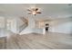 Open living room, kitchen, and staircase at 205 Tulip Drive, Covington, GA 30016