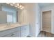 Bathroom with double vanity, walk-in shower, and separate tub at 205 Tulip Drive, Covington, GA 30016