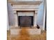 Ornate fireplace with decorative fire screen at 895 W Paces Ferry W Rd, Atlanta, GA 30327