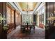 Formal dining room featuring a large table, built-in cabinetry, and chandelier at 4665 Riverview Rd, Atlanta, GA 30327