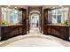 Elegant bathroom with dual vanities and custom cabinetry at 4665 Riverview Rd, Atlanta, GA 30327