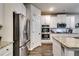Well-equipped kitchen featuring stainless steel appliances and pantry at 1025 Fable Ln, Hampton, GA 30228