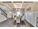 Bright dining room with hardwood floors and wainscoting at 1025 Fable Ln, Hampton, GA 30228