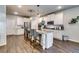 Modern kitchen with white cabinets, granite counters and island at 1025 Fable Ln, Hampton, GA 30228