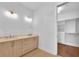 Elegant bathroom with dual vanity, large closet, and marble countertops at 8212 Main St # 1202, Woodstock, GA 30188
