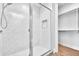 Modern shower with subway tile and frameless glass enclosure at 8212 Main St # 1202, Woodstock, GA 30188