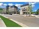 Street view of modern commercial buildings and parking at 8212 Main St # 1202, Woodstock, GA 30188