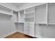 Spacious walk-in closet with ample shelving and hanging space at 8212 Main St # 1202, Woodstock, GA 30188