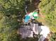 Aerial view showing house, pool, and backyard sports court at 1199 Old Lathemtown Rd, Canton, GA 30115