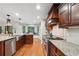Eat-in kitchen with stainless steel appliances and granite countertops at 1199 Old Lathemtown Rd, Canton, GA 30115