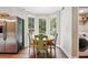 Bright kitchen nook with built-in seating and view of backyard at 1199 Old Lathemtown Rd, Canton, GA 30115