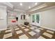 Finished basement with tiled floor and access to backyard at 1199 Old Lathemtown Rd, Canton, GA 30115