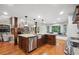 Spacious kitchen with island, stainless steel appliances, and granite countertops at 1199 Old Lathemtown Rd, Canton, GA 30115