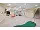 Finished basement with play area and golf turf at 1199 Old Lathemtown Rd, Canton, GA 30115