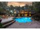 Expansive pool with stonework and lounge chairs at 1199 Old Lathemtown Rd, Canton, GA 30115