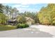 House exterior with a three-car garage and large driveway at 1199 Old Lathemtown Rd, Canton, GA 30115
