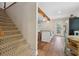 Elegant staircase leading to lower level kitchen at 1199 Old Lathemtown Rd, Canton, GA 30115