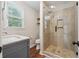 Modern bathroom with walk-in shower and updated vanity at 1199 Old Lathemtown Rd, Canton, GA 30115