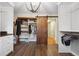 Large walk-in closet with barn door and ample shelving at 1199 Old Lathemtown Rd, Canton, GA 30115