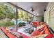 Relaxing covered patio overlooking the pool; perfect for outdoor entertaining at 1199 Old Lathemtown Rd, Canton, GA 30115
