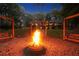 Fire pit with swings and view of home at 1199 Old Lathemtown Rd, Canton, GA 30115