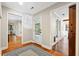 Bright entryway with hardwood floors and views into adjacent rooms at 1199 Old Lathemtown Rd, Canton, GA 30115