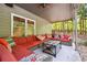 Covered patio with sectional sofa and coffee table at 1199 Old Lathemtown Rd, Canton, GA 30115