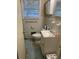 Clean bathroom with a single sink vanity and shower/tub combo at 456 Big John Se Trl, Marietta, GA 30067
