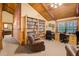 Spacious home office with built-in bookshelves and two desks at 1785 Whitley Rd, Dacula, GA 30019