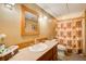 Clean bathroom with a shower/tub combo and updated vanity at 1785 Whitley Rd, Dacula, GA 30019