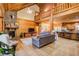 Open living space with high ceilings and stone fireplace at 1785 Whitley Rd, Dacula, GA 30019