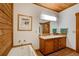 Bathroom with double vanity, large mirror, and a soaking tub at 1785 Whitley Rd, Dacula, GA 30019